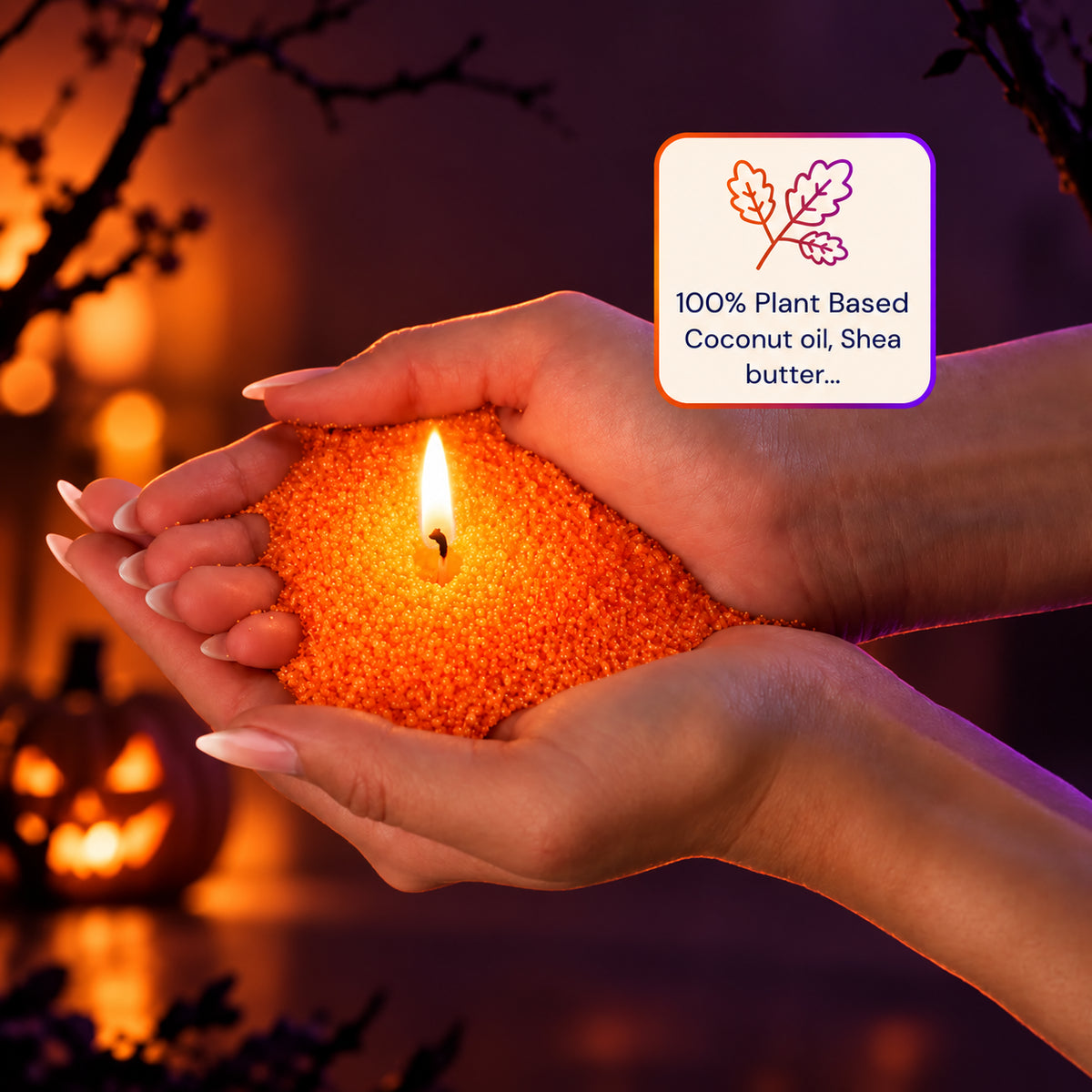 Hands holding orange plant-based wax pearls around a lit wick