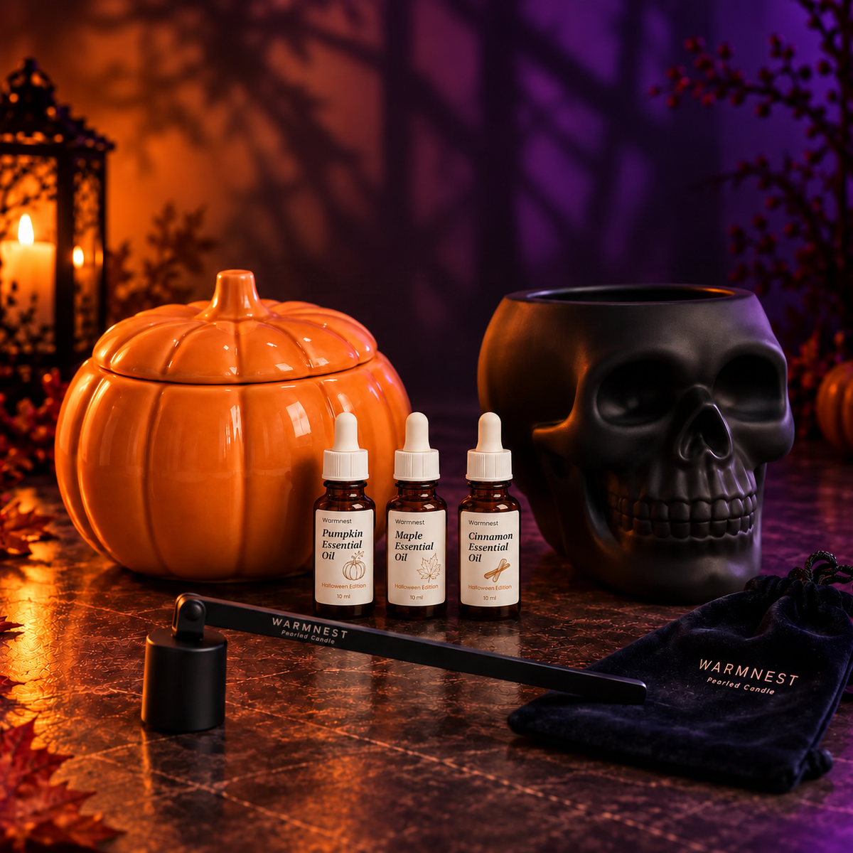 The Halloween Toolkit: Pumpkin Vessel, Skull Vessel, three essential oils and a candle snuffer with its velvet pouch