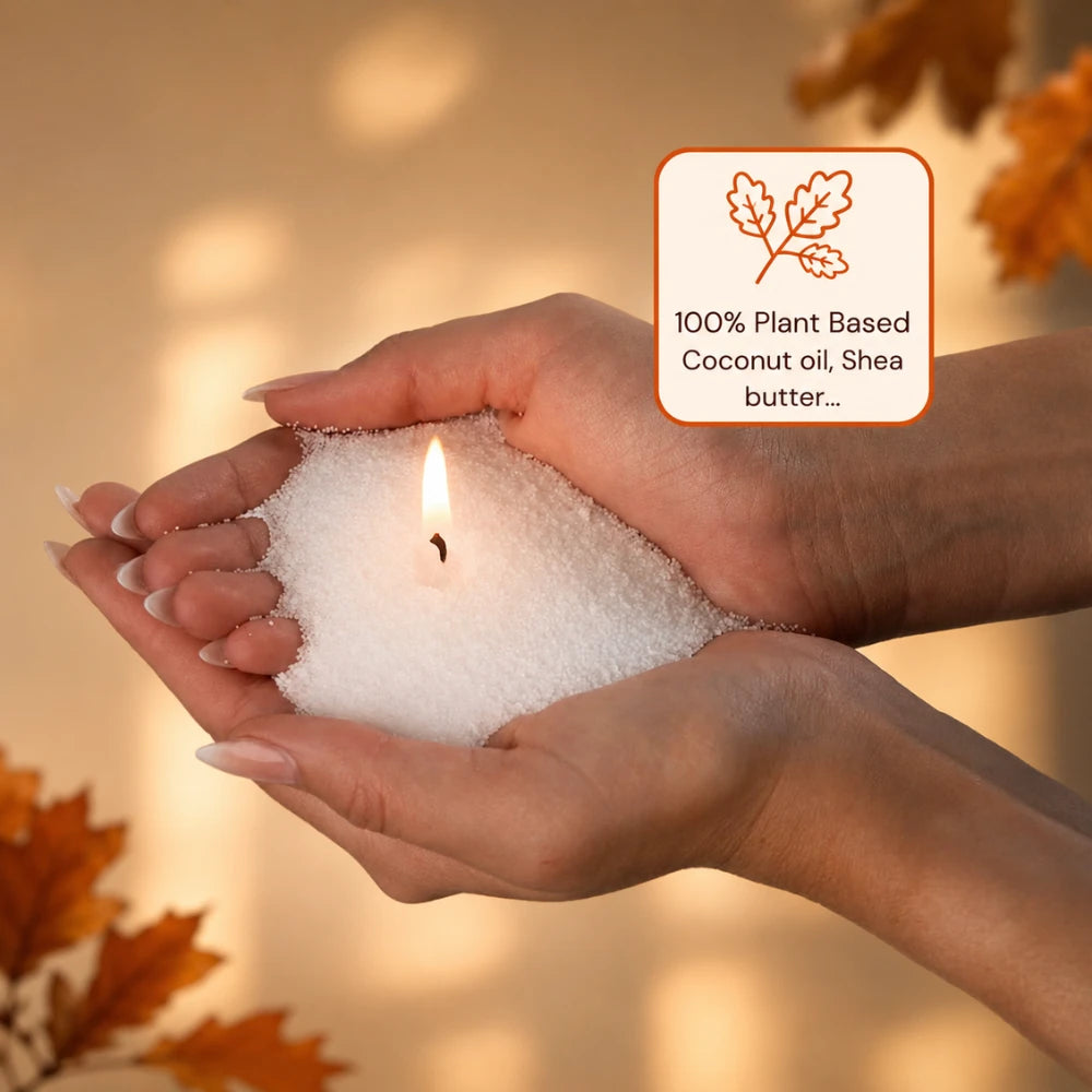 Hands holding 100 percent plant based Warmnest wax pearls made with coconut oil and shea butter, one wick alight